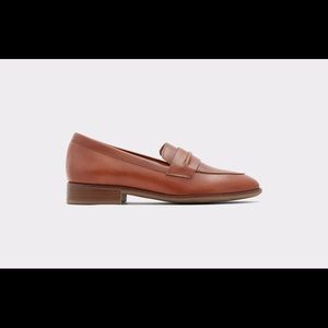 Aldo Rallina, cognac leather slip-on loafer.